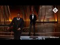 Will Smith smacks Chris Rock but to Guile’s Theme