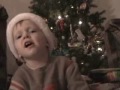 Adorable kid wishes happy holidays to friends and family