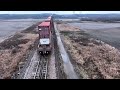 3 mile long monster stack train crosses the Sibley Railroad Bridge