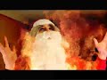 Phelous, as Santa Claus, on fire and screaming 