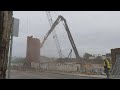 Demolition of smokestack at Osram Sylvania Central Falls Rhode Island