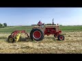 Raking Hay with the Case 930 and New Holland 56 rake.