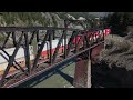 PASSENGER AND FREIGHT TRAINS THROUGH BRIDGES, ROCK SHEDS, FIELDS, CANYONS, CLIFFS AND RIVERS IN SOUT