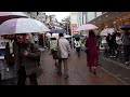Walking down Takeshita Dori, Harajuku in the rain