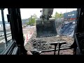 Sany 215 Excavator loading trucks