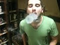 Blowing a Smoke ring through a smoke ring