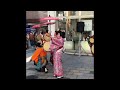 A great street performer in Japan. Festive Mambo. They're chindonya.