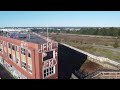 Raw footage - Drone flying around the derelict Lord Line Buildings and dock, Hull. River Humber