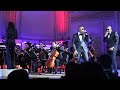 Jay-Z performing at Carnegie Hall with Nas and Alicia Keys