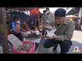Snack filter rice noodles in Liuzhou, Guangxi广西柳州融水滤粉，柴火现煮粉，5元配料丰富，阿星吃猪网油烧蔗