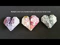 Creating shape of LOVES the colorful origami way from  paper money of 3 countries.
