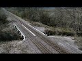 Eastbound BNSF Z train with a friendly crew crosses Keeney Creek near Orrick, MO