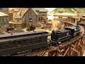 A leased D&RG locomotive pulls a coach on my C&S Narrow Gauge Railroad