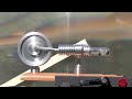 STIRLING ENGINE FRESNEL Lens on a Steek Solar powered Stirling Engine