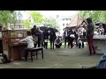 11 year old George Harliono plays Moonlight Sonata (3rd mov) on a Street Piano in the rain.