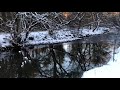 Sunset and snow down by the river