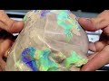 HUGE! 11,000 carat uncut gem opal gets carved to expose the top quality colors inside