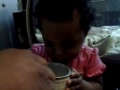 baby girl opening canister with teeth.3gp