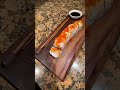Finishing a homemade walnut and epoxy sushi board