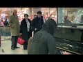 Skateboarder in hoodie amazes public with sublime piano music