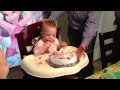 Riley eating her first birthday cake