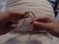 Quick release knot tip