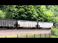 A Norfolk Southern freight train climbs through beautiful Horseshoe Curve