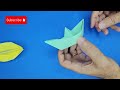 Making origami with my son - paper boat
