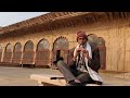 Old man with a flute mesmerized us at Deeg Palace in Rajasthan | Bharatpur