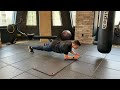 Plank w/ Side to Side Arm Raises
