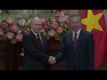 Russia's Vladimir Putin greeted by Vietnamese President To Lam