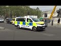 Two Met Police PCVs Responding through Trafalgar Square