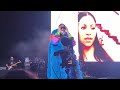 ASHANTI STRUGGLES TO HIDE PREGNANCY WITH FUR COAT & SWEATS IT OUT ON STAGE