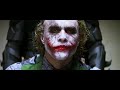 Joker (Heath Ledger) talks with Joker (Joaquin Phoenix)