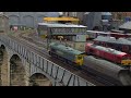 Accurascale Class 66 66507 DCC Sound Freghtliner Livery pulling a rake of Bachmann HHA hopper wagons