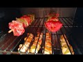 Chicken & steak kabobs on vertical Pit Boss