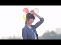 Tall Chinese girl in a JK uniform for a photo shoot under the natural scenery