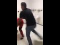 Guy gets dropped on his head in a bathroom fight