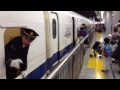 Shinkansen arrives and conductor opens window just at arrival time!