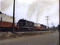 Chicago Central geeps start a coal train Wallace yard Freeport in 1988