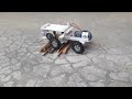 diy RC  tractor crossing through tree logs