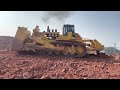 The biggest bulldozer in the world Komatsu D575 working in the mountains