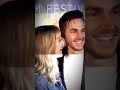 Chris wood and Melissa benoist.and everybody's watchin her but she is looking at you.