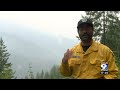 Ore fire continues to burn following early showers