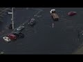 AERIALS: Excessive rainfall floods South Florida homes and airport, strands cars