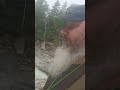 Getting that shiny.  prospecting on the river in vermont panning for gold.