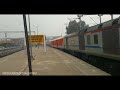 Ghaziabad WAP7 in lead of Dibrugarh New Delhi Rajadhani Express departing from NJP