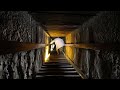 Walking down steep steps inside the Great Pyramid