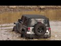 Derek driving his Jeep through the pond @ Rausch Creek