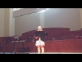 Kaylie Wells singing at church